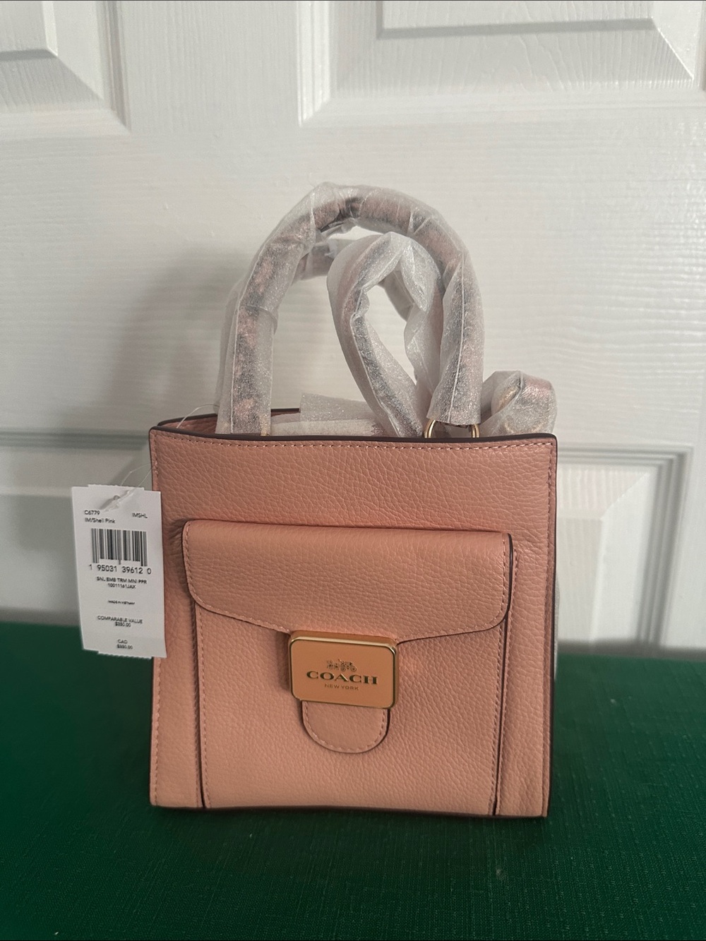 Coach Pepper Pebbled Leather Mini Top Handle Bag in Blush